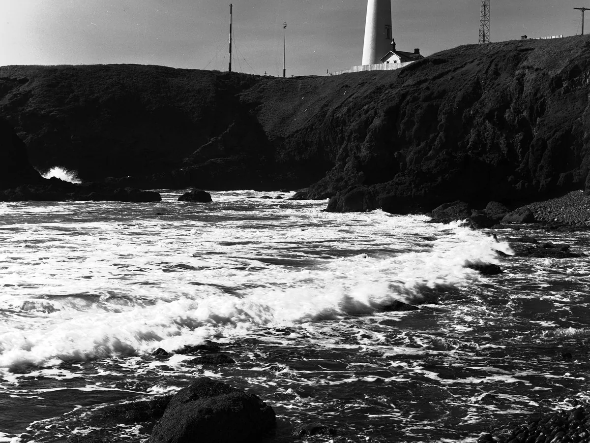 Black and white lighthouse coast, before enhancement