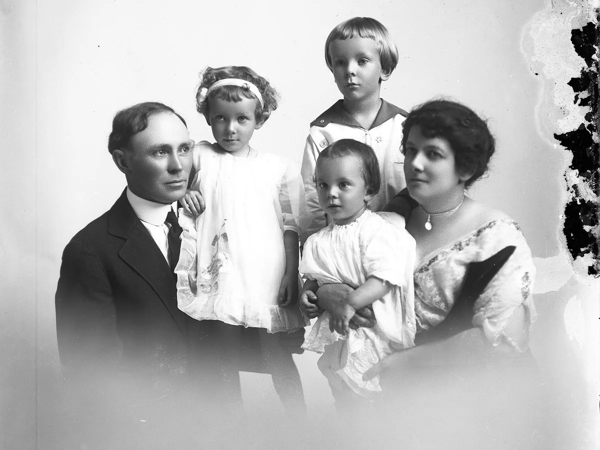 Damaged glass-plate family portrait, before enhancement